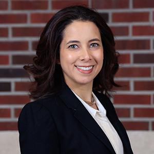 Image of Anne Marie Martin, a white woman with brown hair wearing a blouse and jacket.